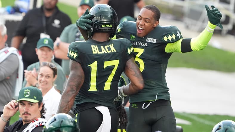 Louisville’s Tarik Black and Cameron Dantzler celebrates scoring a touchdown against the Dallas Renegades at Lynn Family