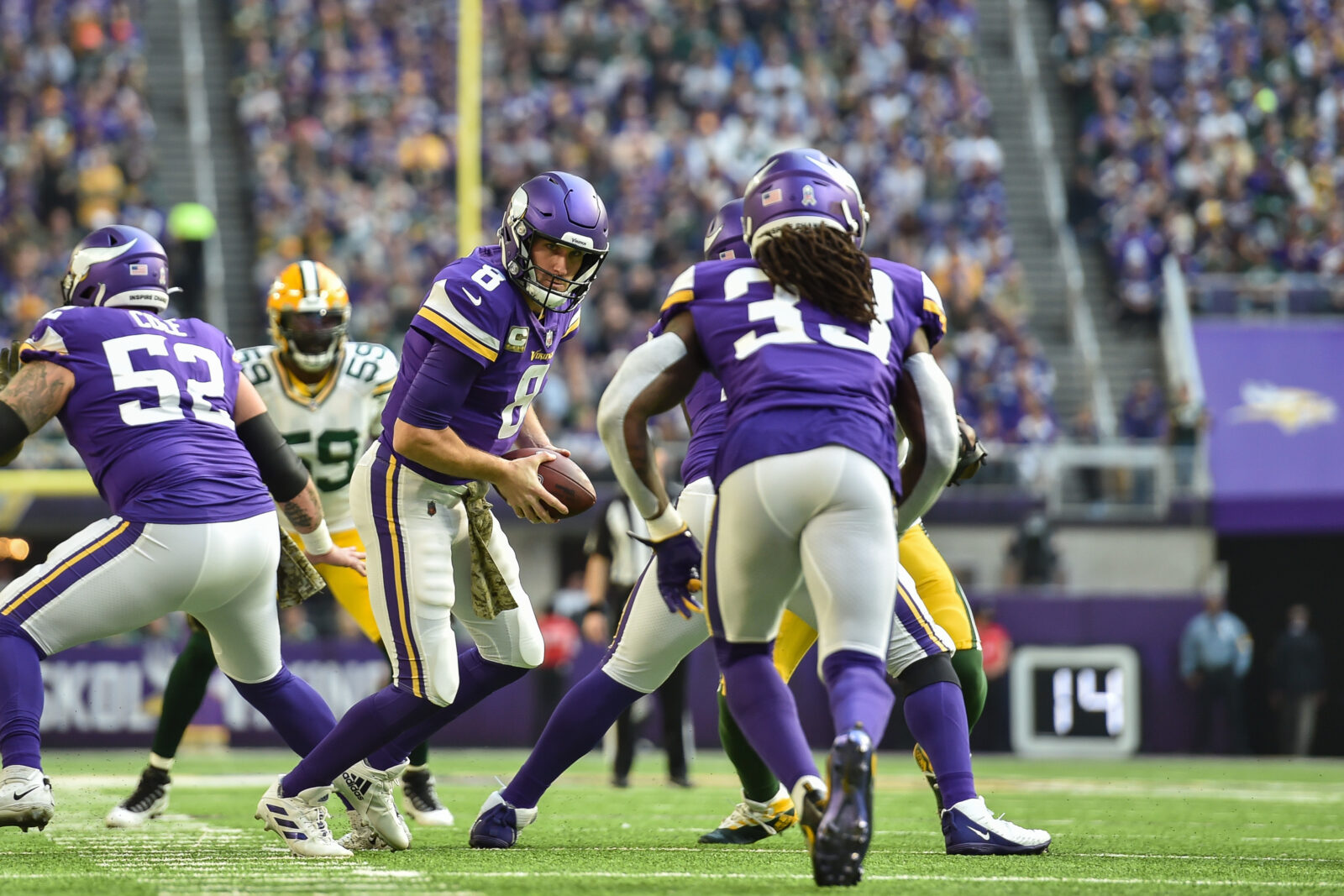 Cook's 4 TDs help Vikings knock off Packers