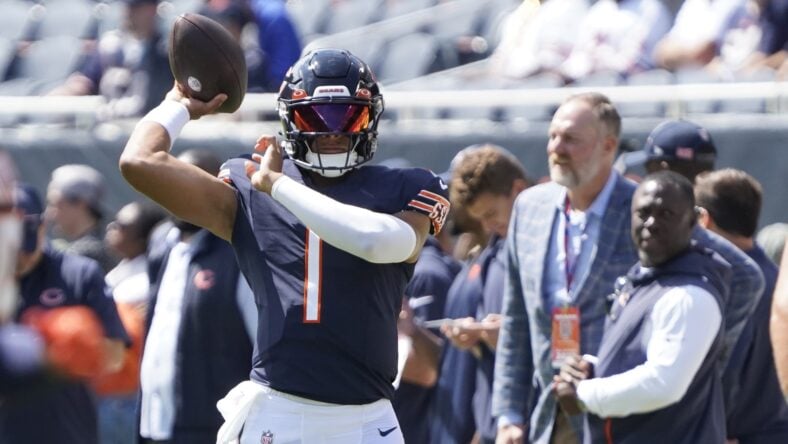Fields throws TD passes to Moore and Herbert as the Bears beat the Titans  23-17
