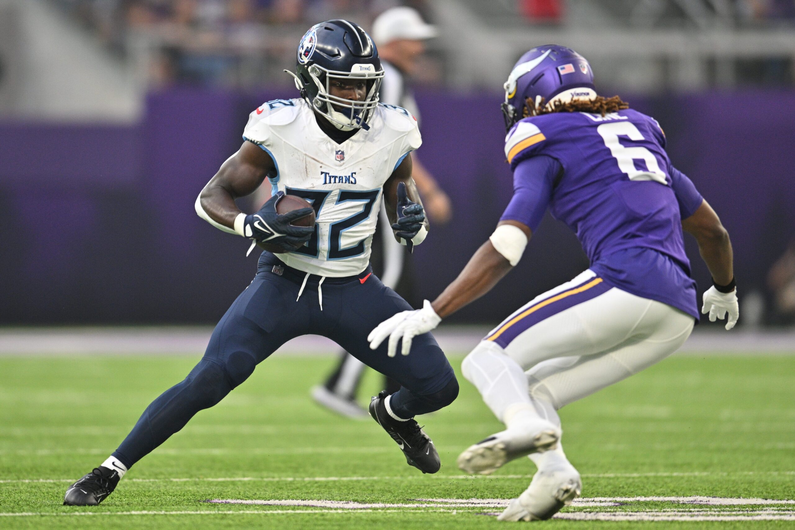 Minnesota Vikings cornerback Andrew Booth Jr. (23) warms up before